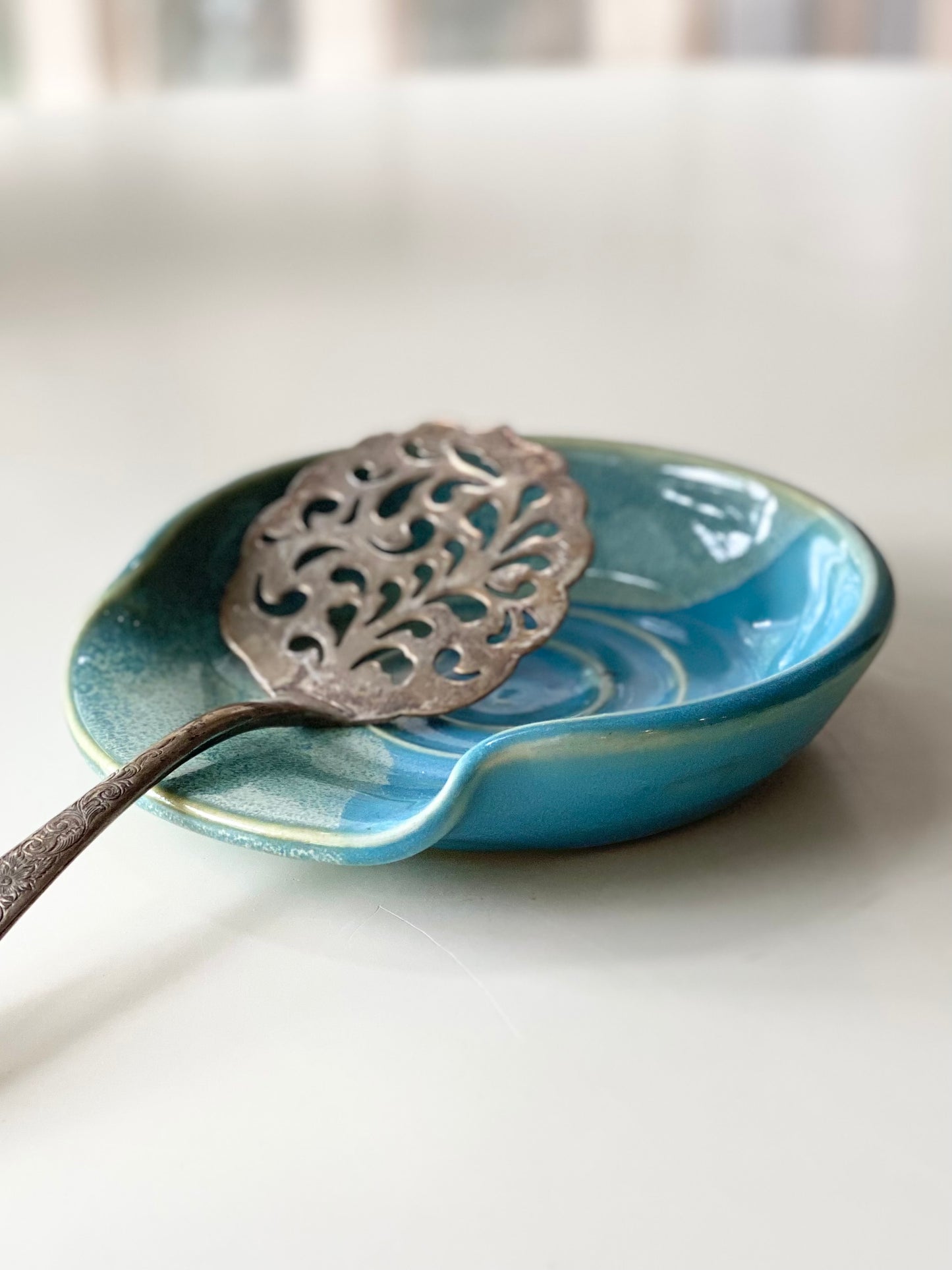 Spoon Rest with a glossy blue and green glaze, 5.25”
