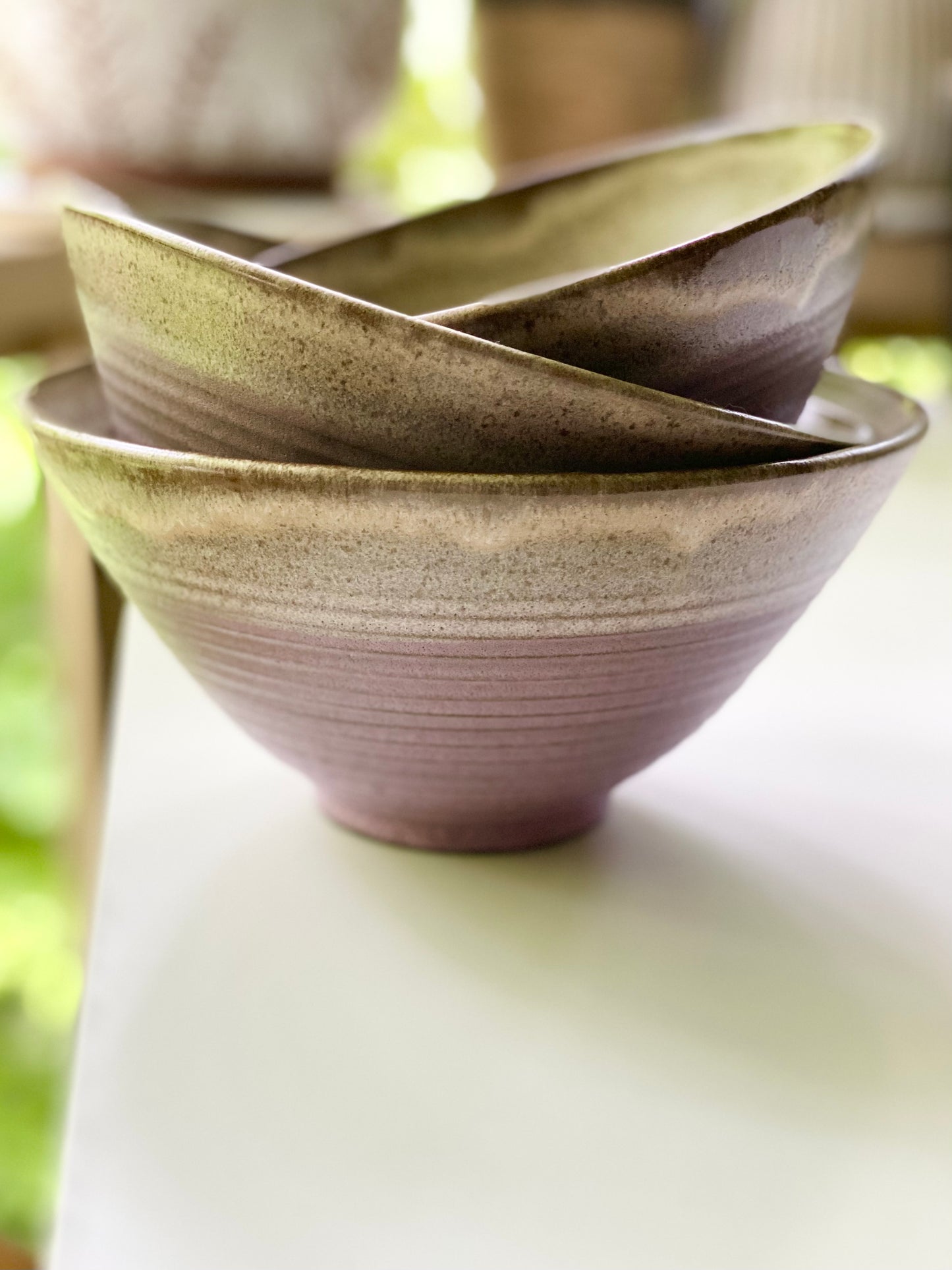 Set of 3 Nesting Bowls in Pink Sierra and Cream, L 5”x8.75”, M 4.5”x8.25”, S 4.25”x7.5”
