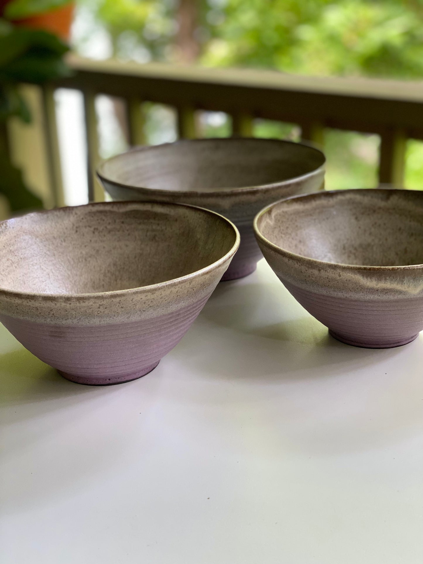 Set of 3 Nesting Bowls in Pink Sierra and Cream, L 5”x8.75”, M 4.5”x8.25”, S 4.25”x7.5”