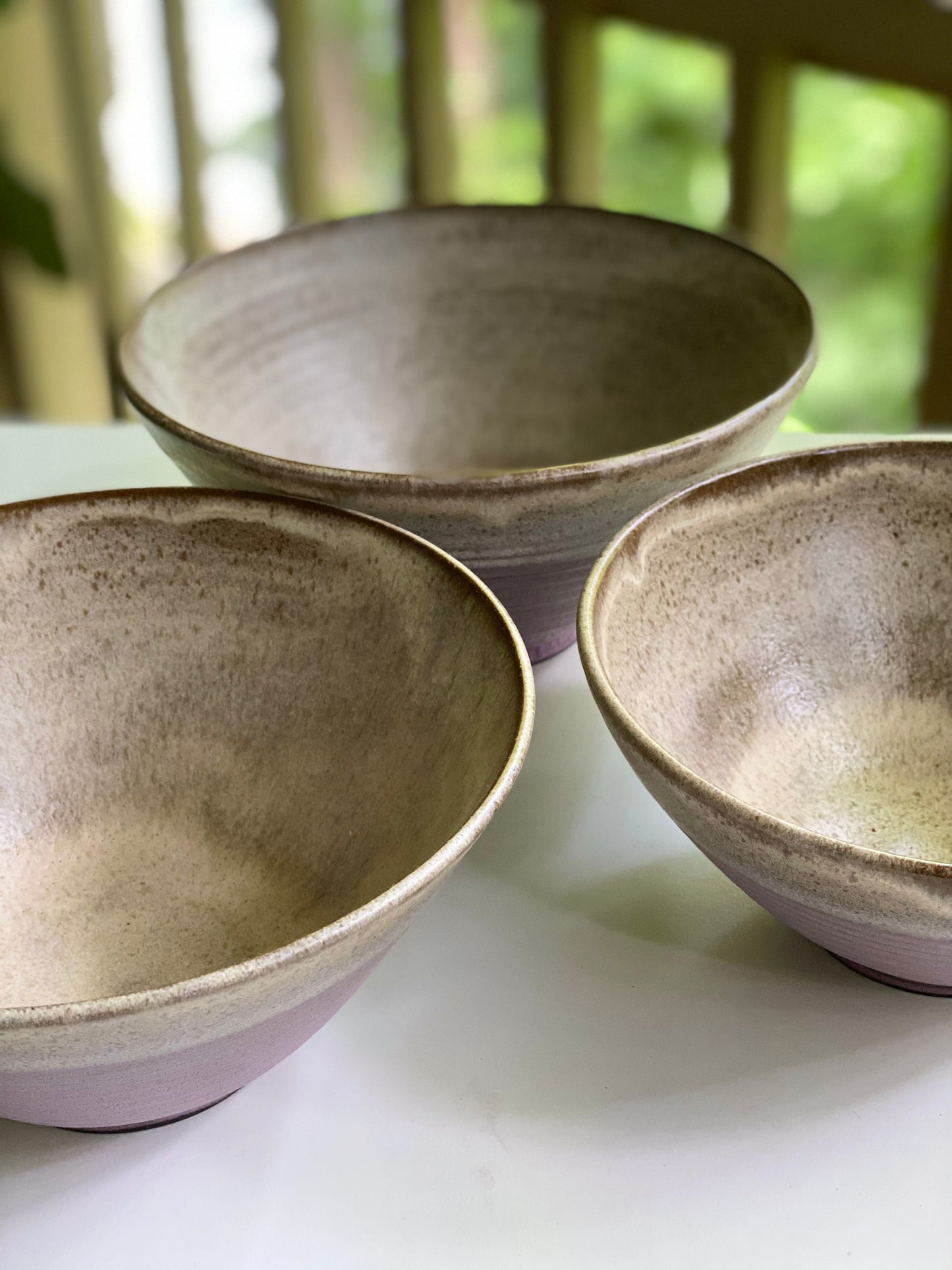Set of 3 Nesting Bowls in Pink Sierra and Cream, L 5”x8.75”, M 4.5”x8.25”, S 4.25”x7.5”